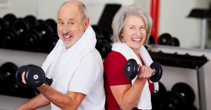 aging couple in gym