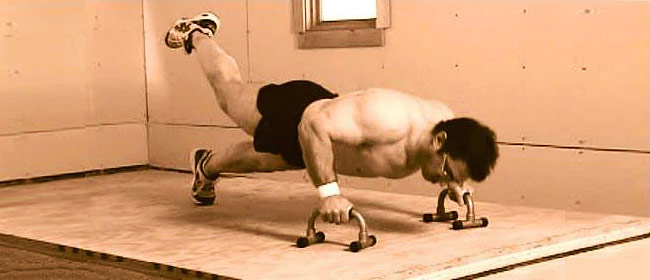 Brooks Kubik doing bodyweight training