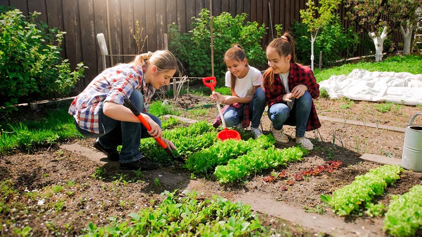 mother and children gardening