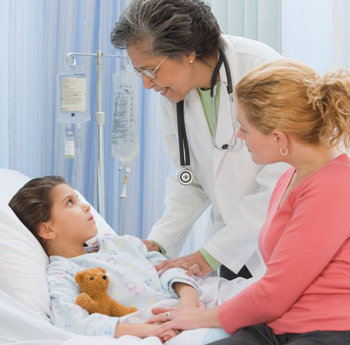 a child with rheumatoid arthritis attended by a doctor