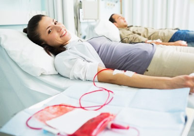 a woman giving blood