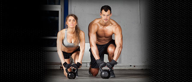 strong couple doing gym work